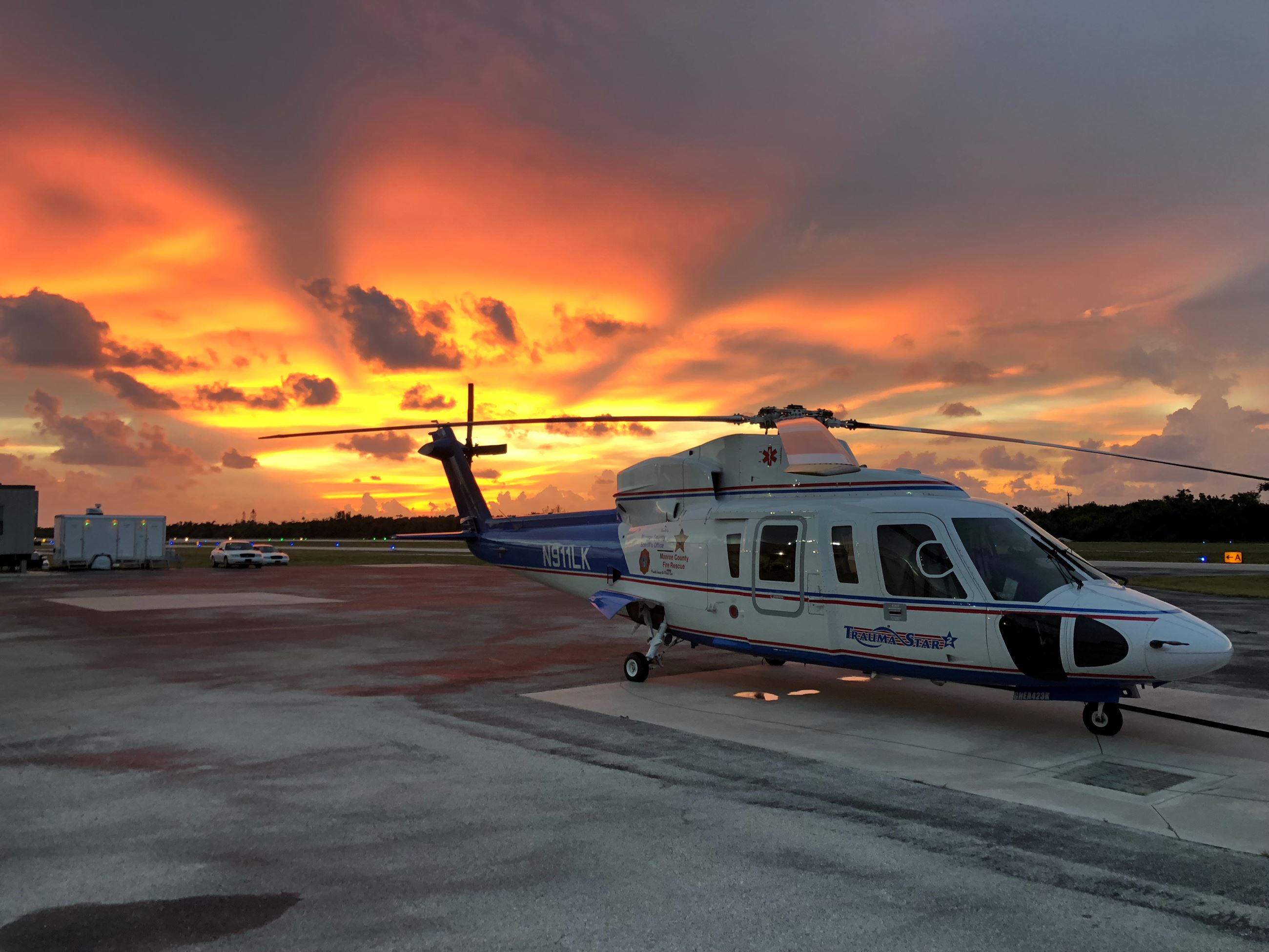 Photo of Trauma Star air ambulance at Marathon hangar during sunset
